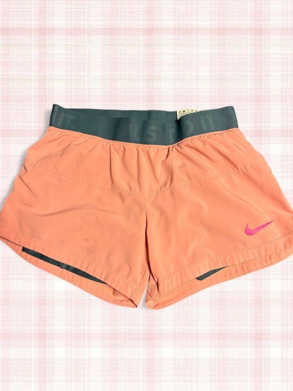 Nike Women’s Coral-Orange Running Shorts with Dark Gray Waistband